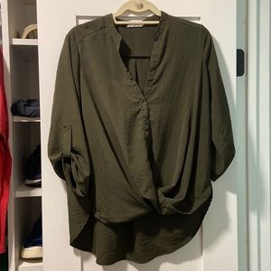 Green size small quarter arm length top.